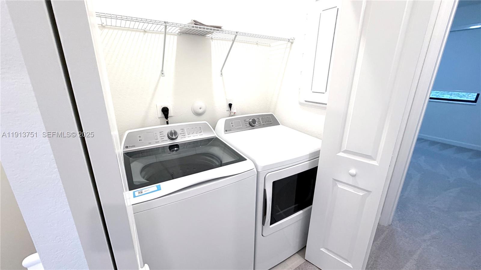 23250 Southwest 133rd Court Homestead, FL 33032 - Photo 22 of 31 a utility room with dryer and washer