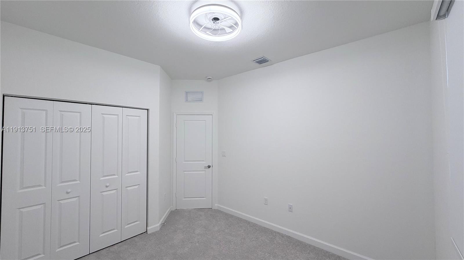 23250 Southwest 133rd Court Homestead, FL 33032 - Photo 23 of 31 an empty room with a cupboard