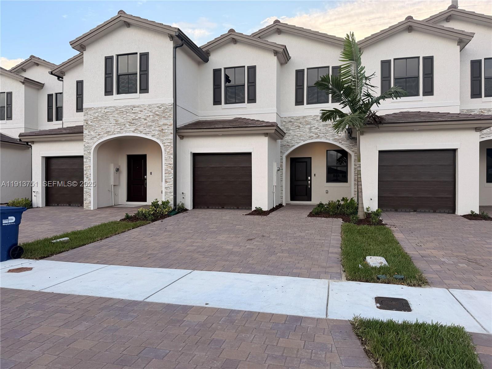 23250 Southwest 133rd Court Homestead, FL 33032 - Photo 27 of 31 a front view of a house with yard and parking