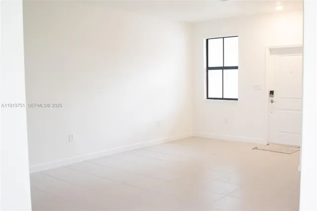 an empty room with a window