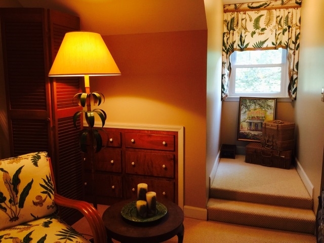 6100 Old Forsyth Road Macon, GA 31210 - Photo 14 of 23 a room with a chair and a lamp