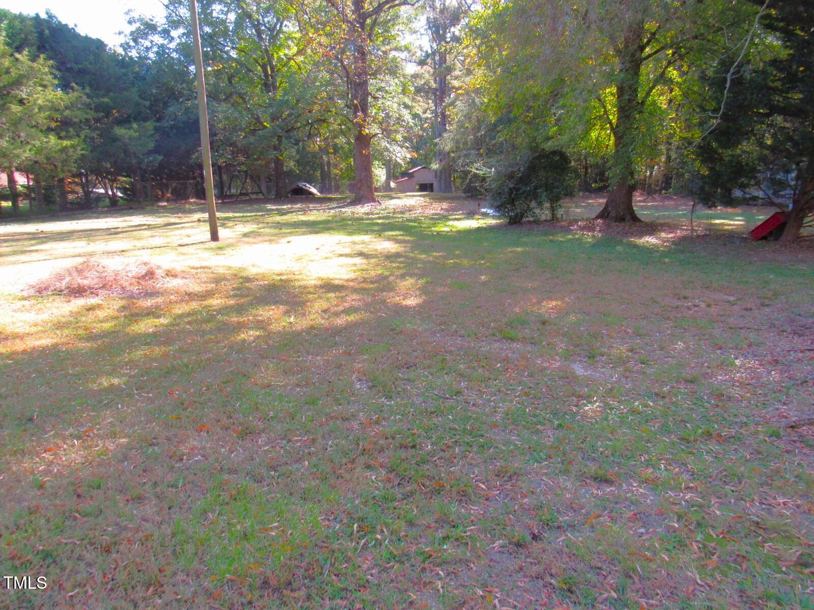 3518 Cheek Road Durham, NC 27704 - Photo 31 of 38 a view of a yard with entertaining space