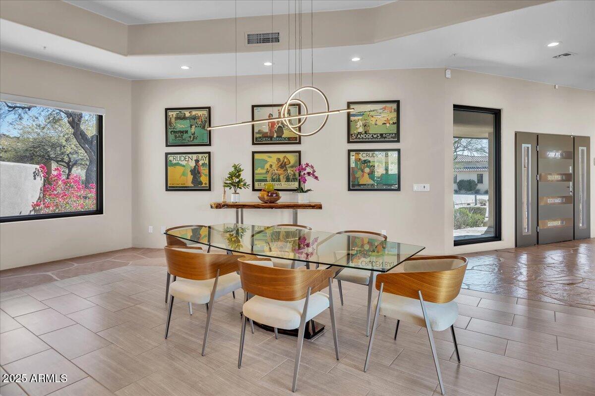 10040 East Happy Valley Road, Unit 300 Scottsdale, AZ 85255 - Photo 14 of 92 a view of a livingroom with furniture and windows