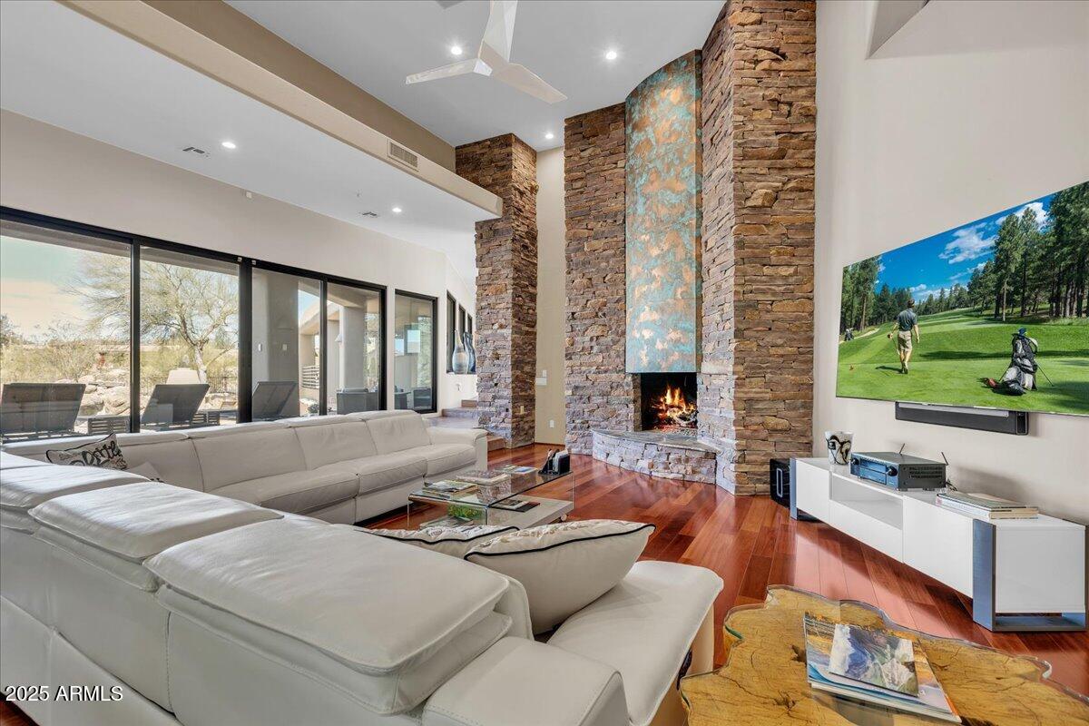 10040 East Happy Valley Road, Unit 300 Scottsdale, AZ 85255 - Photo 18 of 92 a living room with furniture and a large window