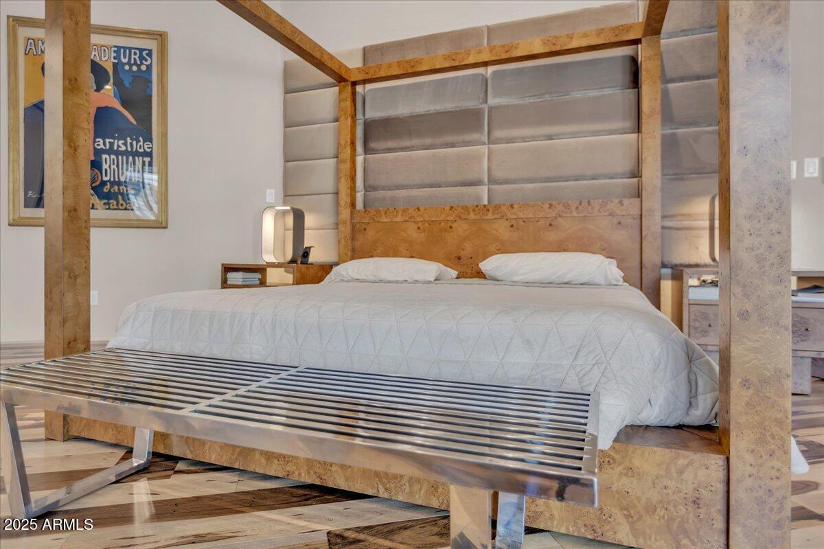 10040 East Happy Valley Road, Unit 300 Scottsdale, AZ 85255 - Photo 22 of 92 a bedroom with a bed and a walk in closet