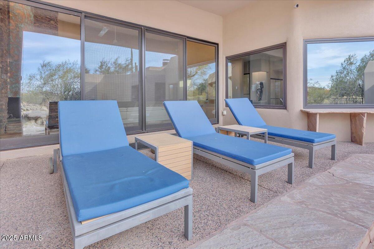 10040 East Happy Valley Road, Unit 300 Scottsdale, AZ 85255 - Photo 48 of 92 a outdoor view with a sitting space
