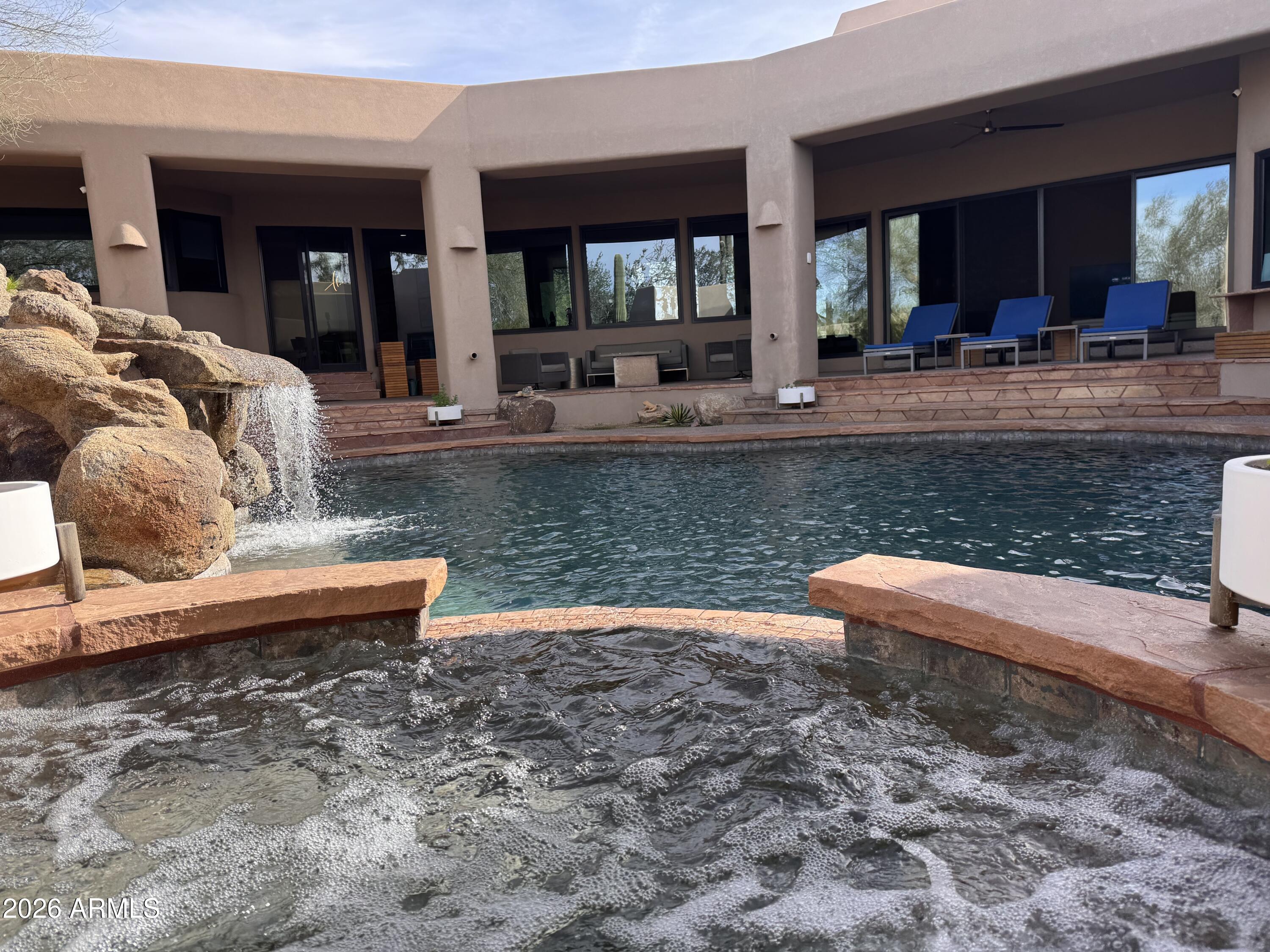 10040 East Happy Valley Road, Unit 300 Scottsdale, AZ 85255 - Photo 51 of 92 Spa with spillover