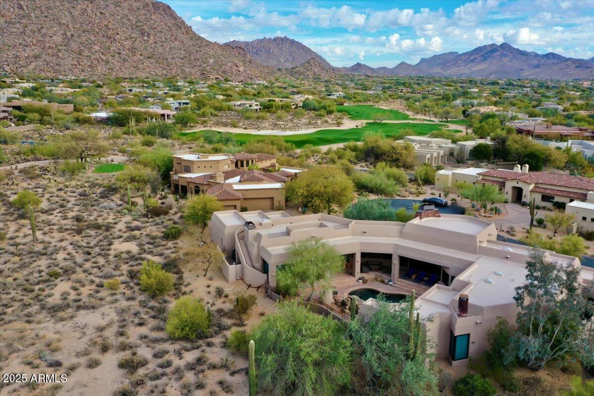 10040 East Happy Valley Road, Unit 300 Scottsdale, AZ 85255 - Photo 80 of 92 a view of a city with a mountain