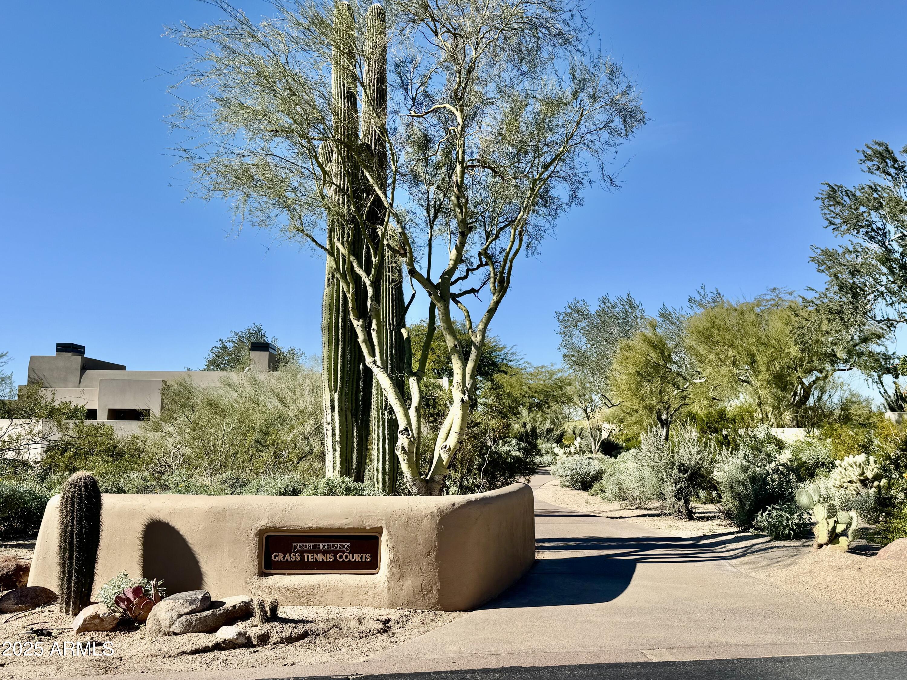 10040 East Happy Valley Road, Unit 300 Scottsdale, AZ 85255 - Photo 86 of 92 Walk way to double grass tennis courts