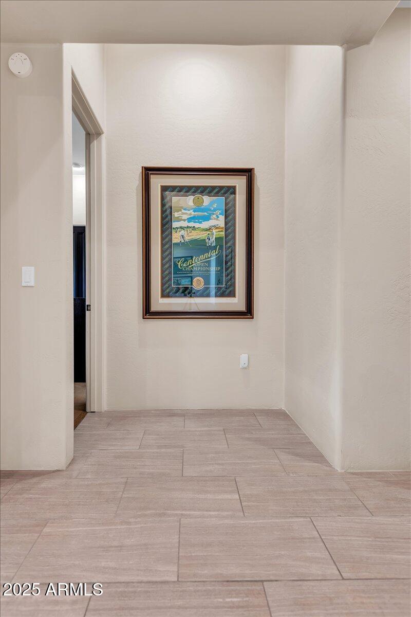 10040 East Happy Valley Road, Unit 300 Scottsdale, AZ 85255 - Photo 9 of 92 a view of an empty room with a window