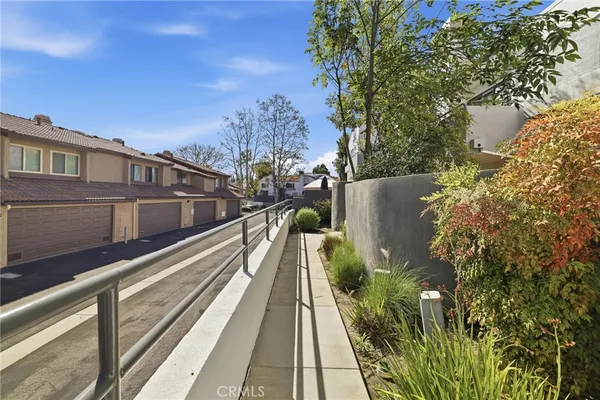 an aerial view of a house with a garden
