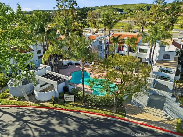 an aerial view of residential building with outdoor space