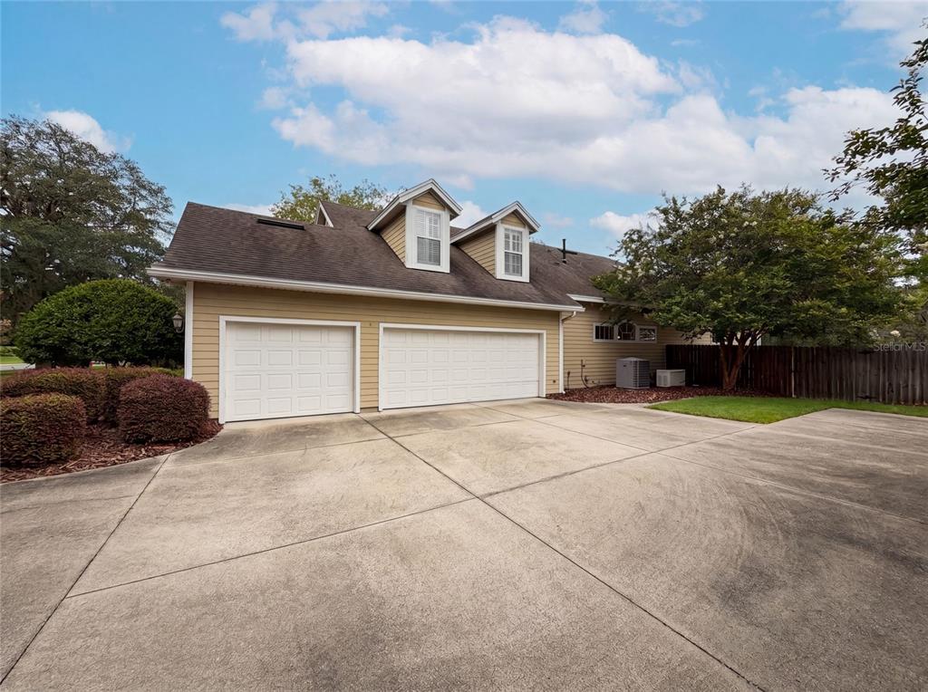 13478 Northwest 9 Road Newberry, FL 32669 - Photo 25 of 31 a view of a house with a yard and garage