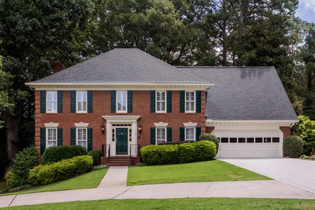 365 Breakwater Ridge Sandy Springs, GA 30328 - Photo 1 of 1 a aerial view of a brick house next to a yard