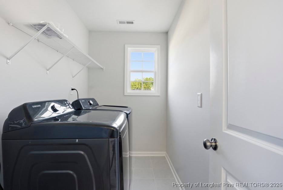 106 Knotts Berry Road Bunnlevel, NC 28323 - Photo 36 of 50 a utility room with dryer and washer
