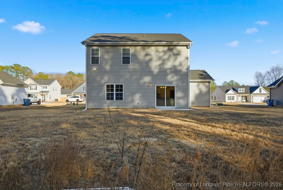 106 Knotts Berry Road Bunnlevel, NC 28323 - Photo 48 of 50 a view of a house with a yard