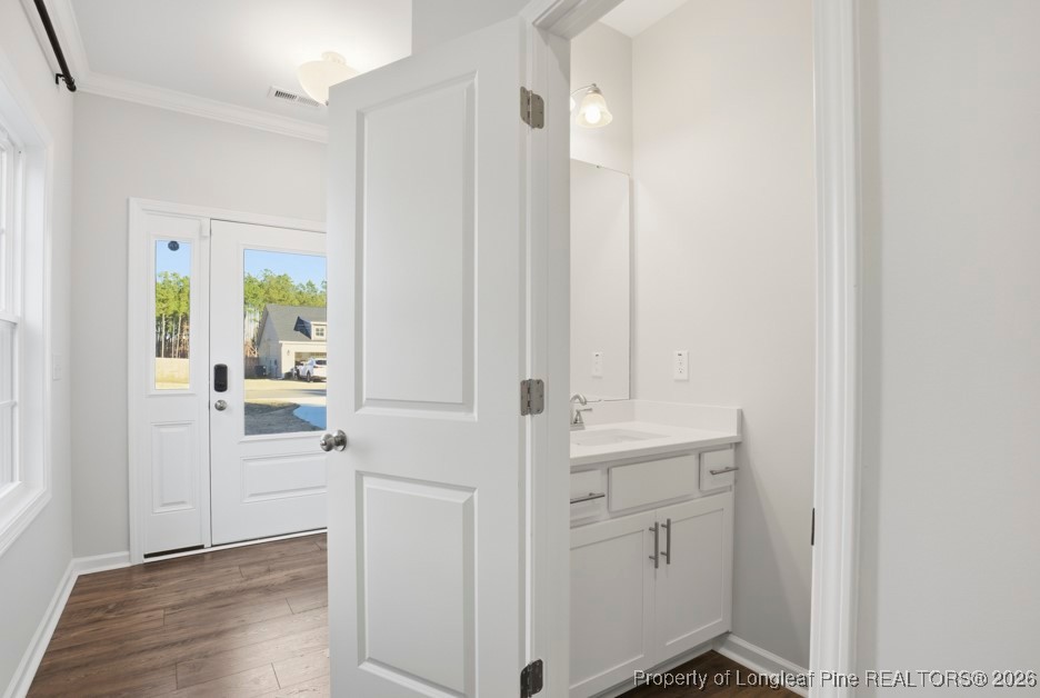 106 Knotts Berry Road Bunnlevel, NC 28323 - Photo 7 of 50 a view of walk in closet with white walls
