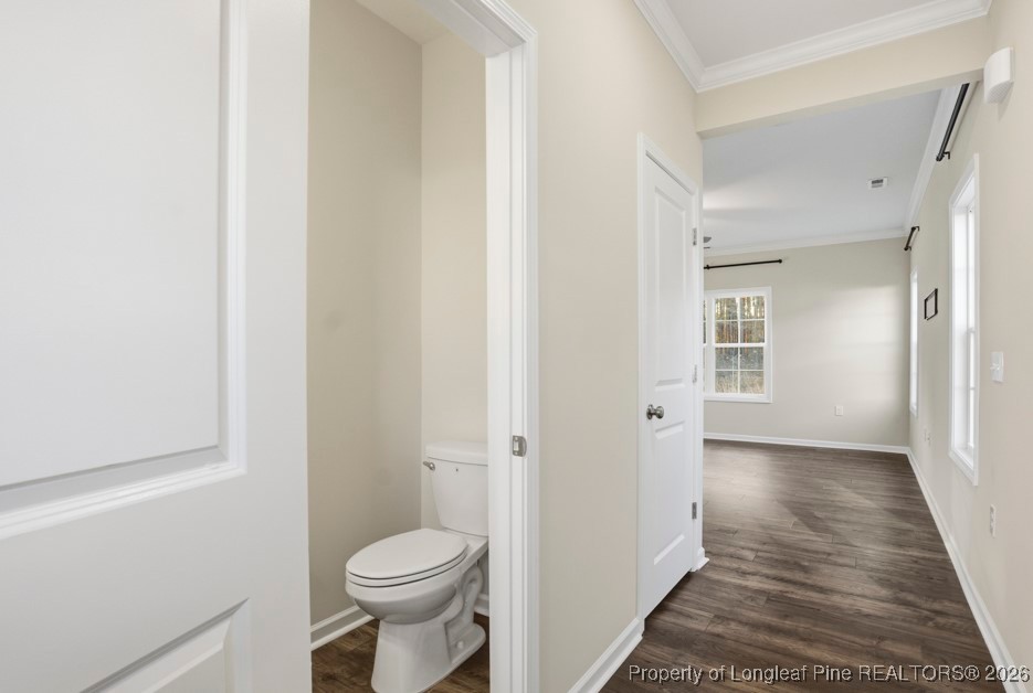 106 Knotts Berry Road Bunnlevel, NC 28323 - Photo 8 of 50 a bathroom with a toilet and a sink
