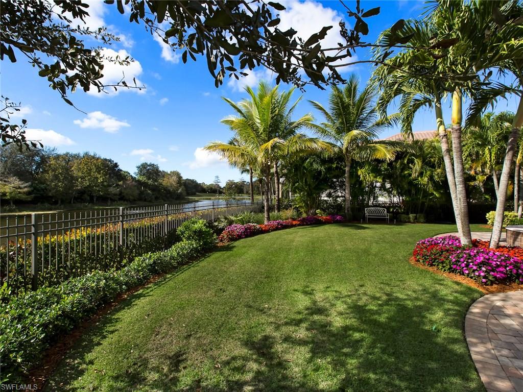 29170 Marcello Way Naples, FL 34110 - Photo 21 of 21 a view of a lake with a big yard