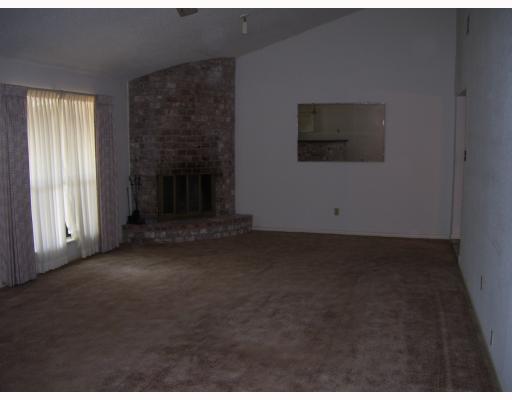 5417 Partridge Road Robstown, TX 78380 - Photo 2 of 5 a view of a livingroom with an empty space and a fireplace