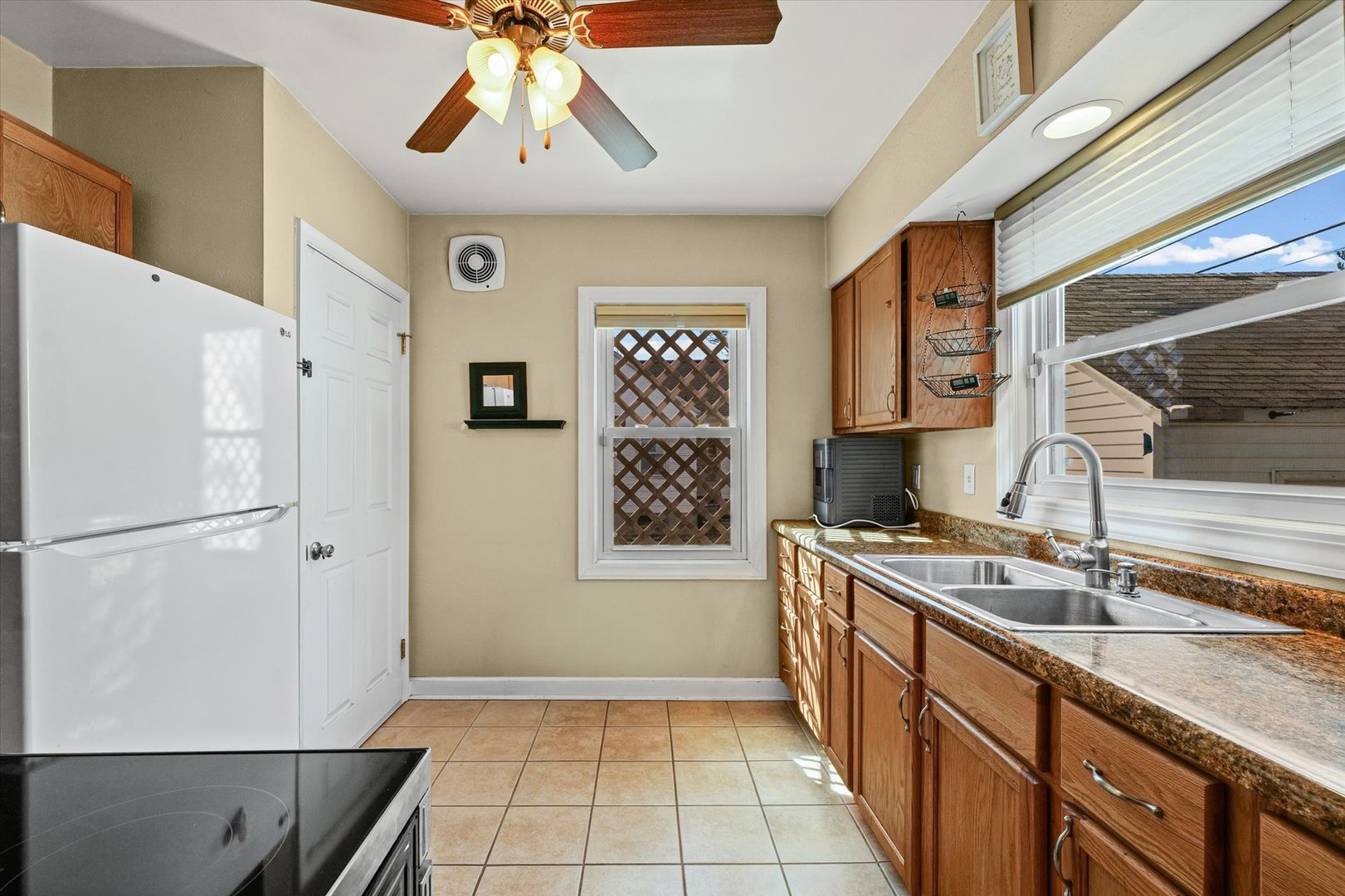 1608 West Springfield Avenue Champaign, IL 61821 - Photo 11 of 36 a kitchen with a sink appliances and cabinets