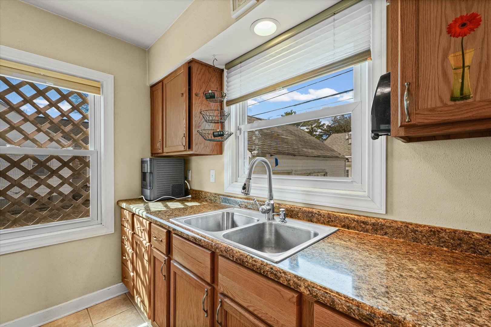 1608 West Springfield Avenue Champaign, IL 61821 - Photo 12 of 36 a kitchen that has a sink stove and cabinets