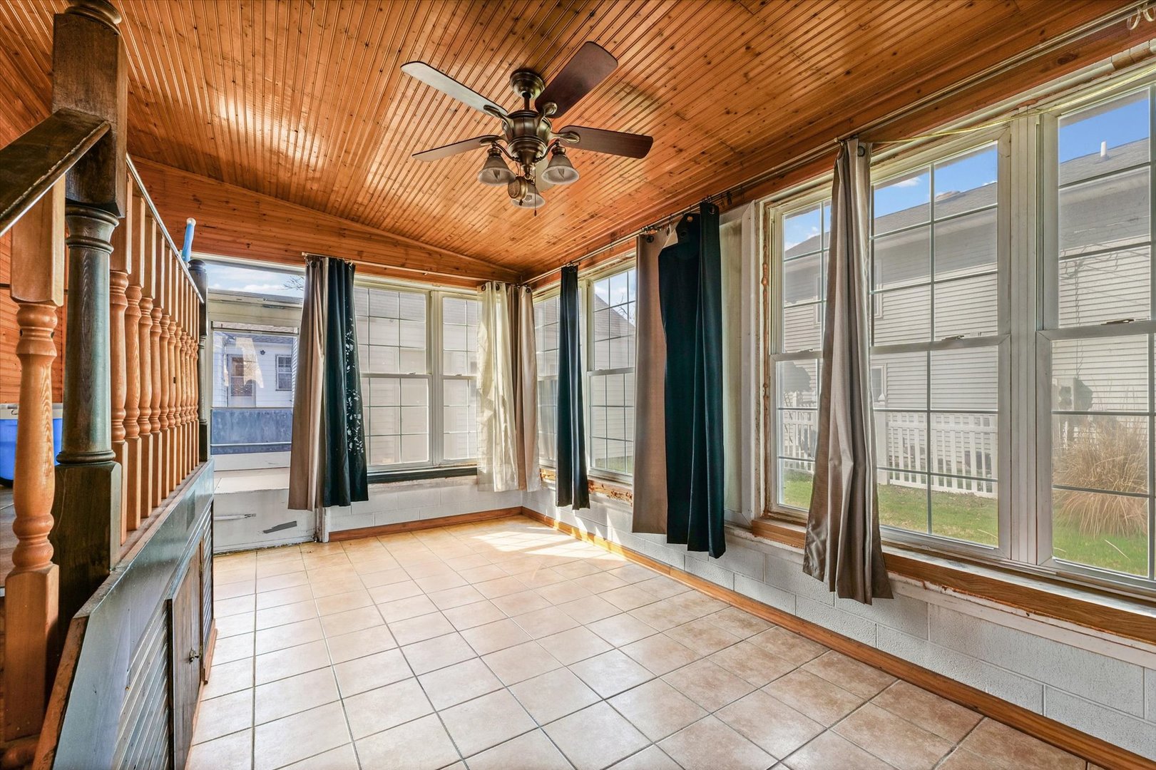 1608 West Springfield Avenue Champaign, IL 61821 - Photo 20 of 36 a view of interior space with wooden floor and fan