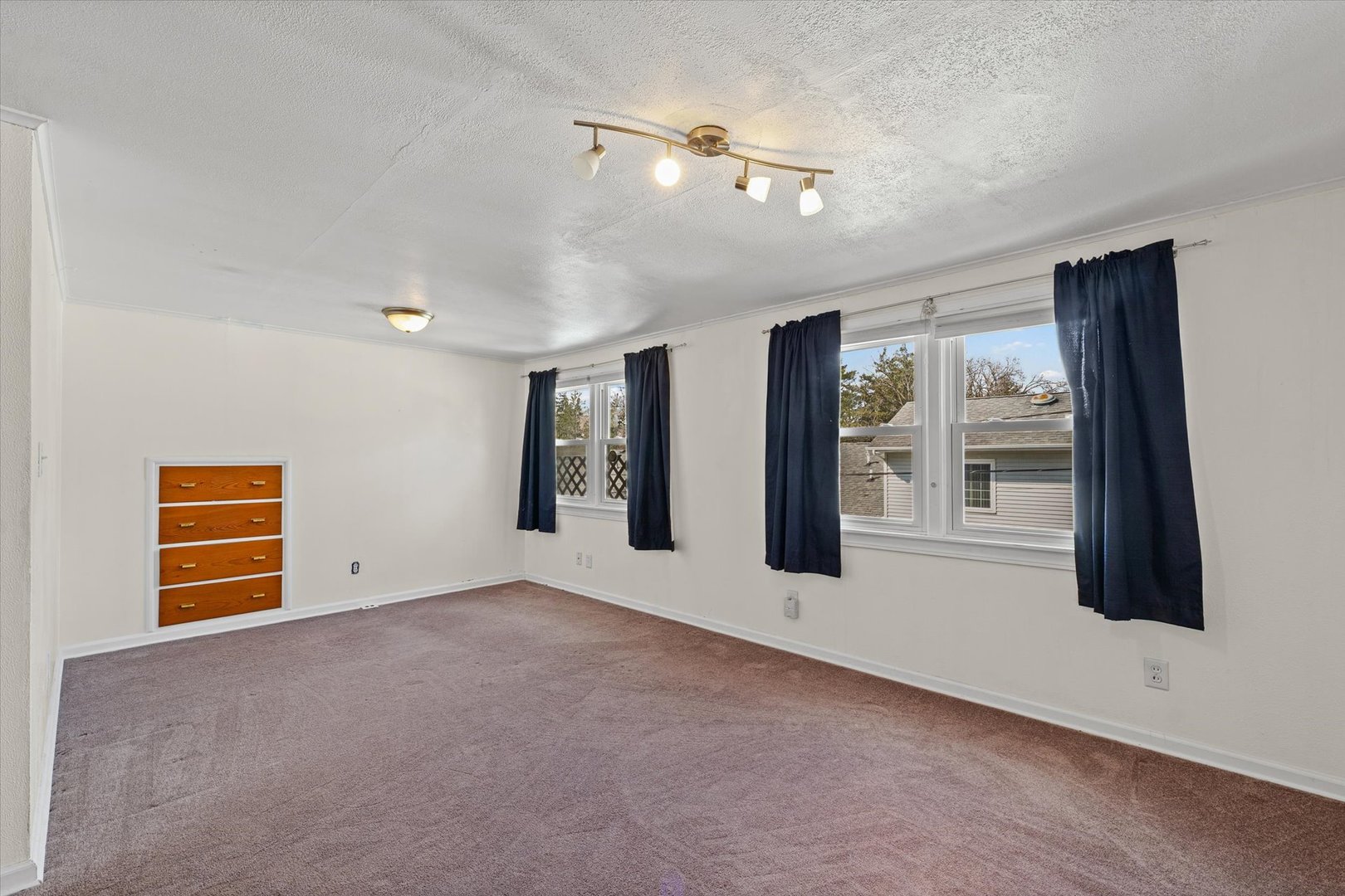 1608 West Springfield Avenue Champaign, IL 61821 - Photo 23 of 36 a view of an empty room with a window