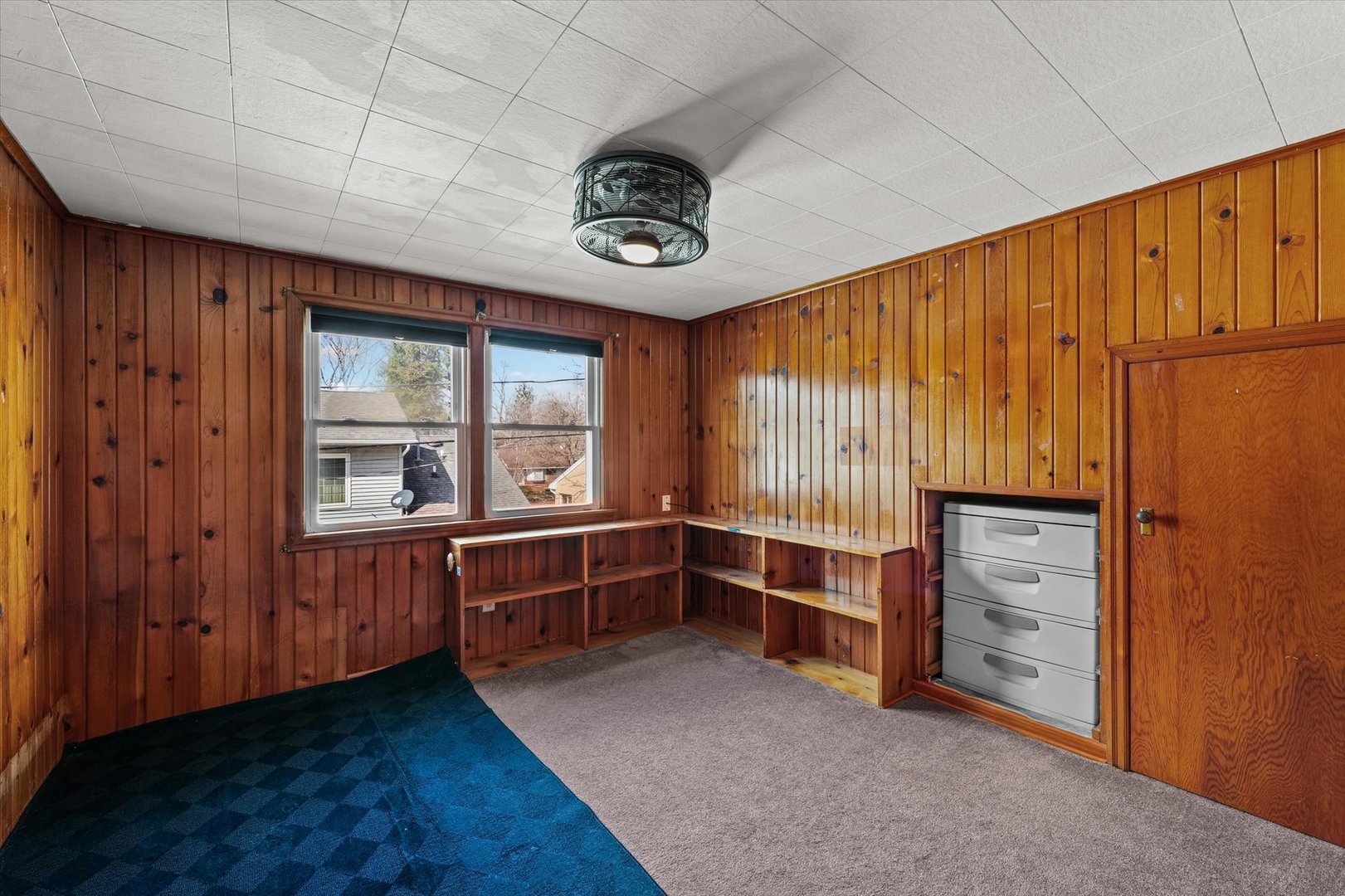 1608 West Springfield Avenue Champaign, IL 61821 - Photo 25 of 36 a view of an empty room with a window