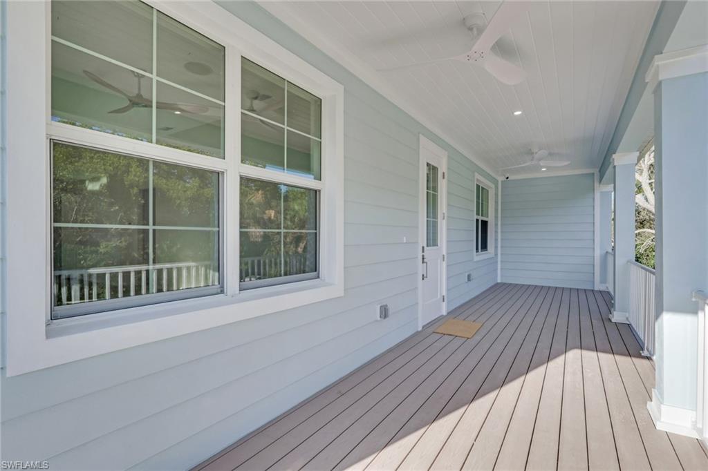 3500 Croton Road, Unit 101 Naples, FL 34104 - Photo 3 of 27 a view of a house with a wooden floor
