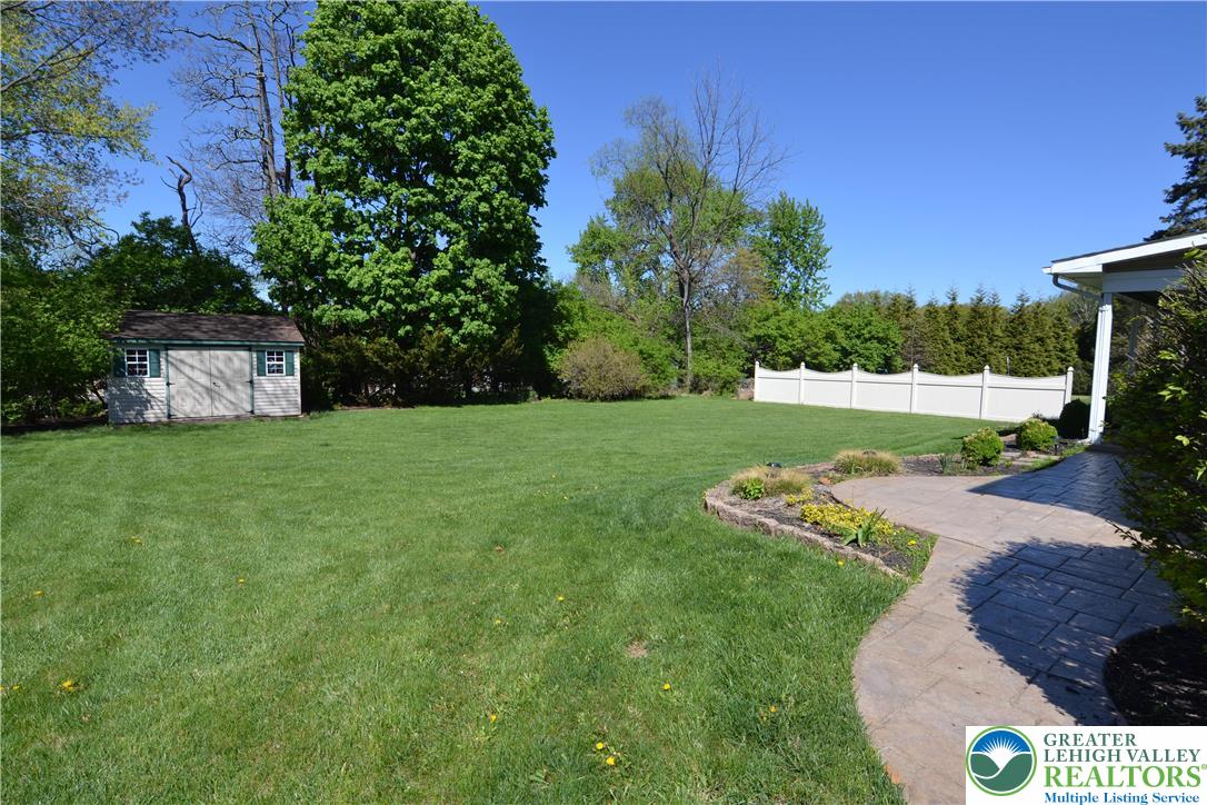 3071 Athena Drive Bethlehem, PA 18017 - Photo 5 of 27 a view of a house with a yard and sitting area