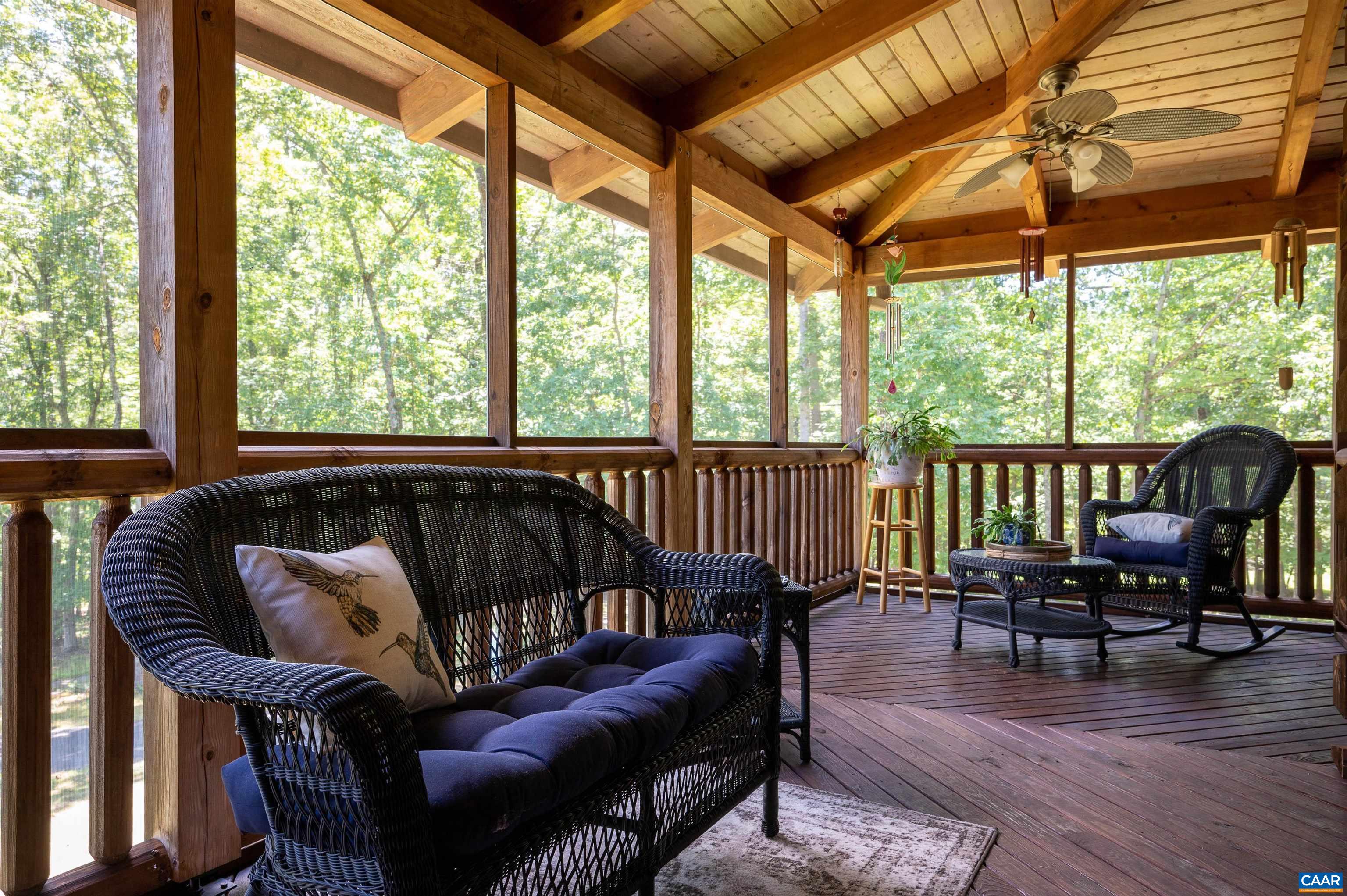 6721 Foster Ridge Charlottesville, VA 22903 - Photo 16 of 45 a roof deck with furniture and wooden floor