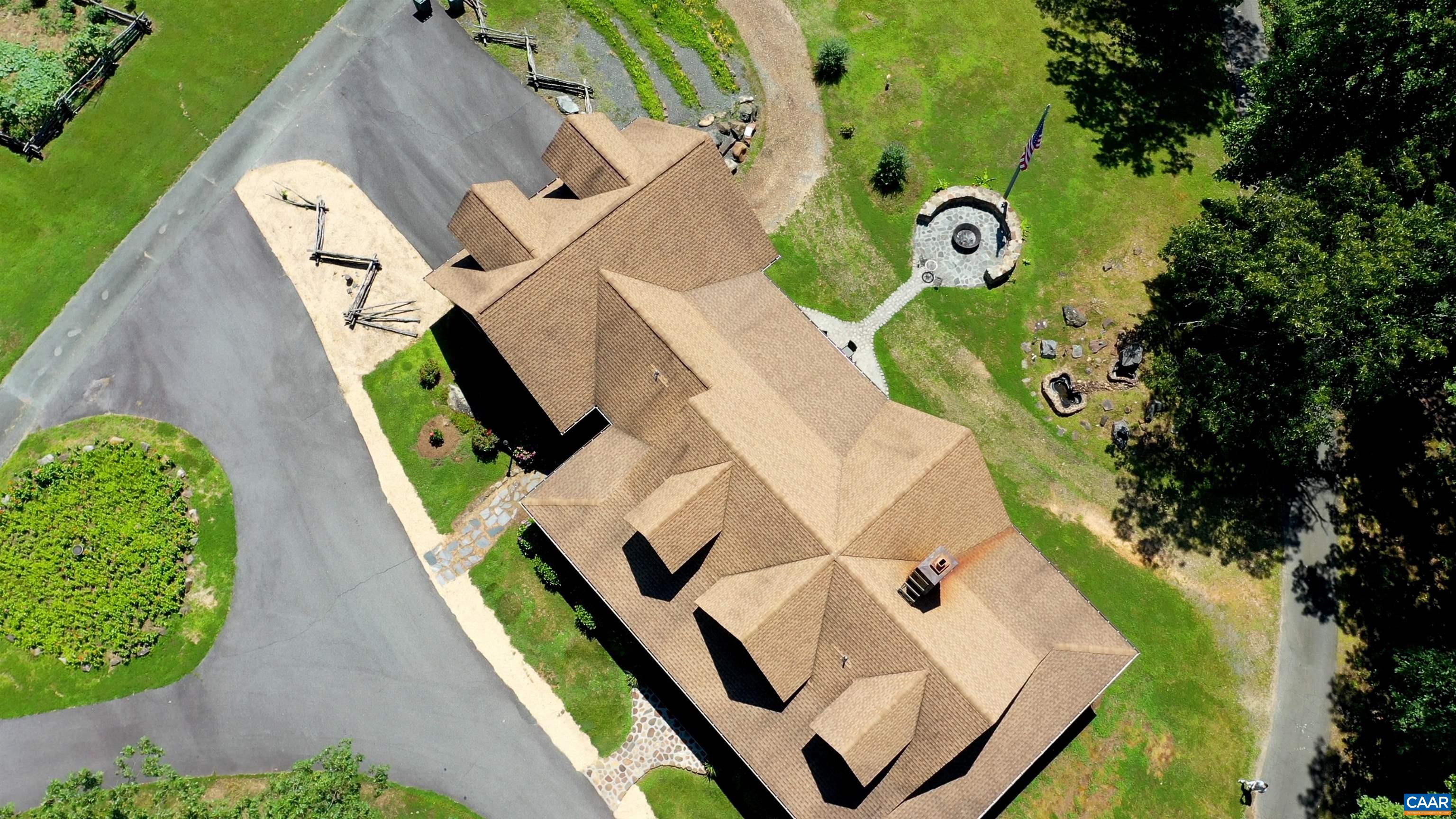 6721 Foster Ridge Charlottesville, VA 22903 - Photo 2 of 45 an aerial view of a house with garden