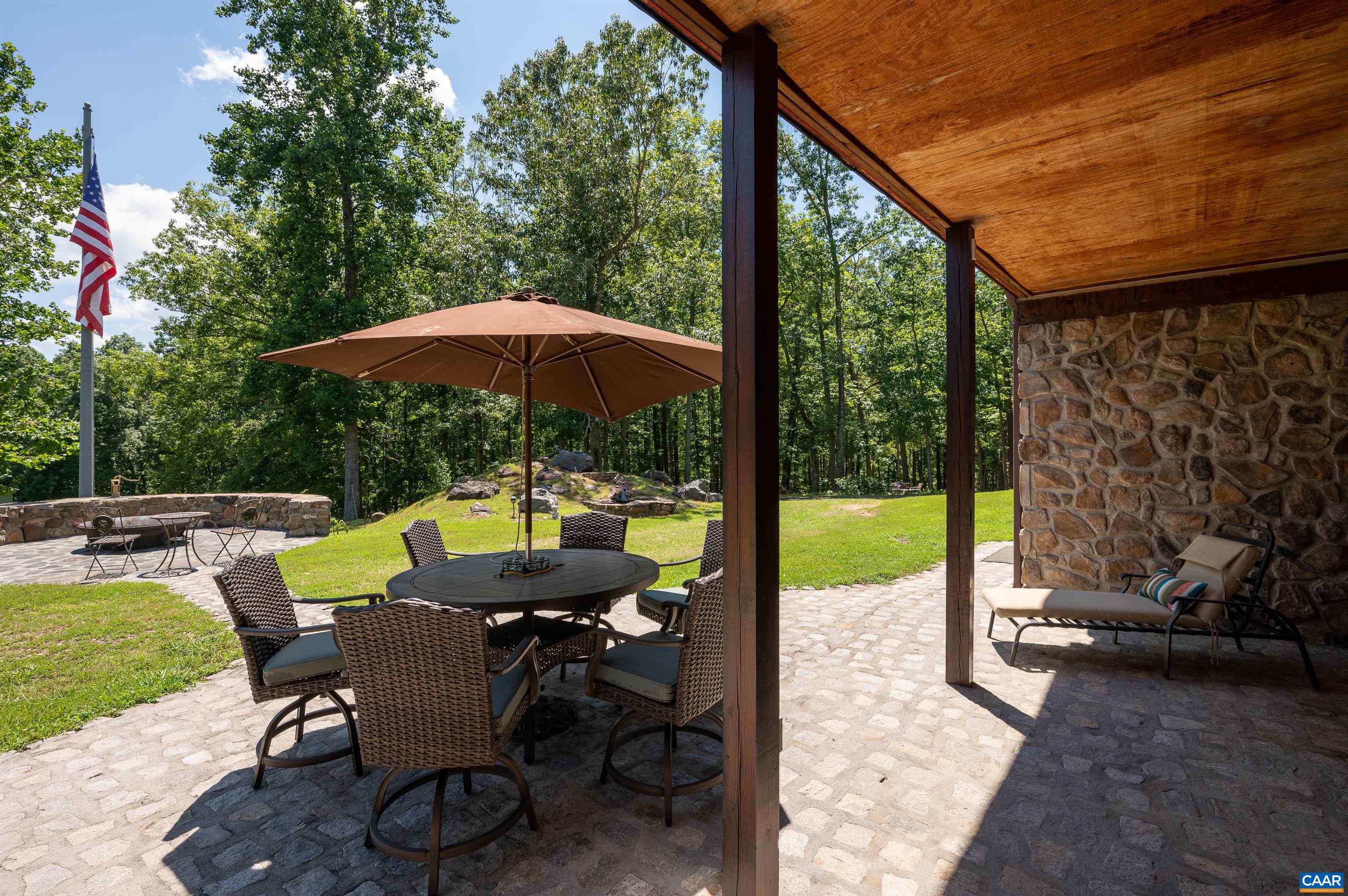 6721 Foster Ridge Charlottesville, VA 22903 - Photo 25 of 45 a view of backyard with furniture and outdoor seating