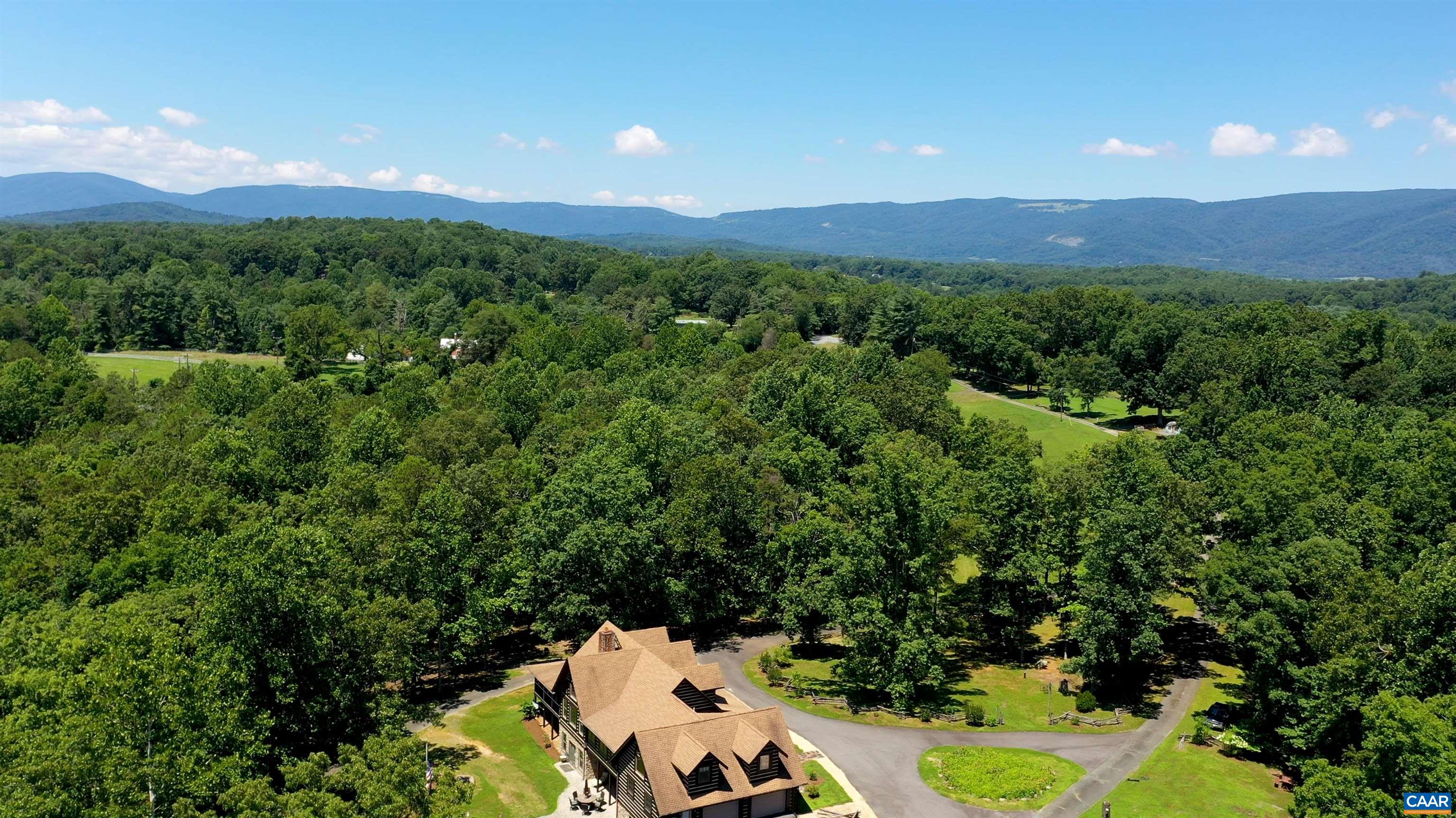 6721 Foster Ridge Charlottesville, VA 22903 - Photo 45 of 45 an aerial view of a house with a yard