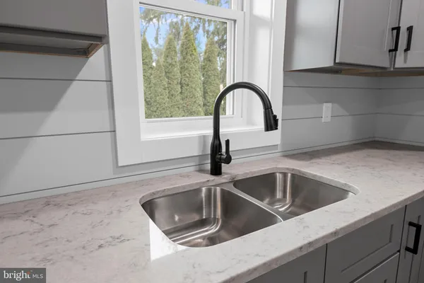 a close view of a sink and tap