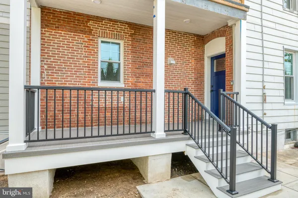 a view of a balcony with staircase