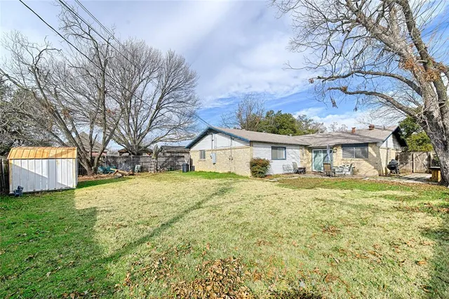 a view of a backyard with a garden