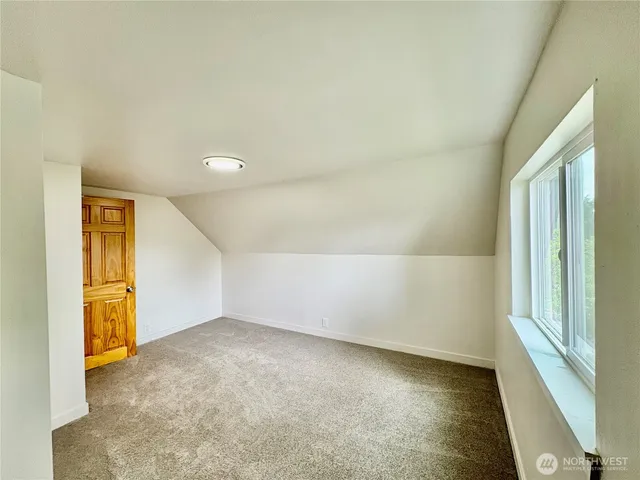 an empty room with a natural light