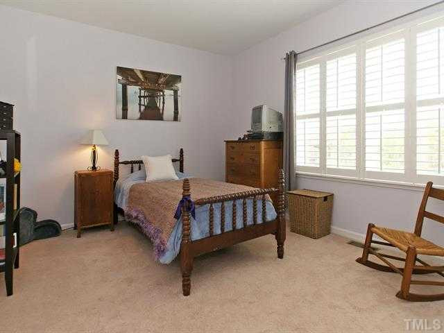 1403 Van Page Boulevard Raleigh, NC 27607 - Photo 19 of 25 The two secondary bedrooms are each a nice size with double door closets. Bedroom