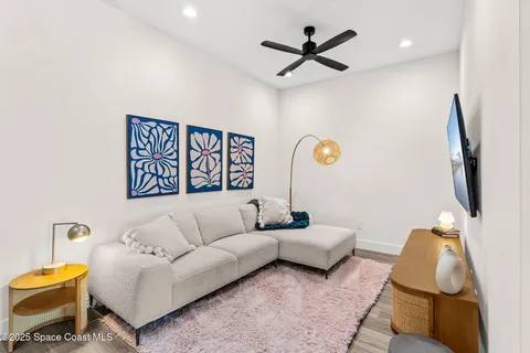 a bedroom with a bed and a table in it