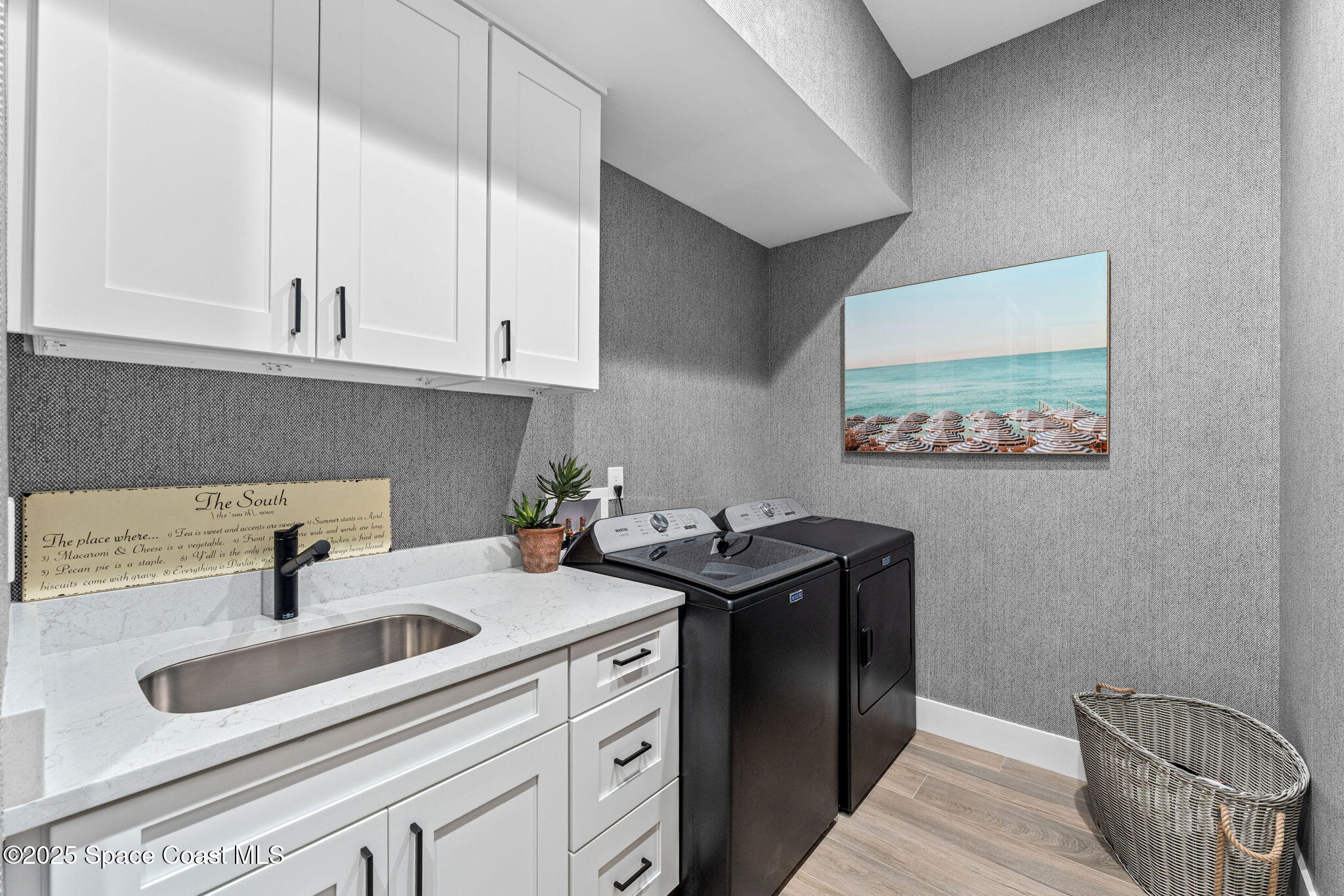 106 4th Avenue Indialantic, FL 32903 - Photo 24 of 37 a kitchen with stainless steel appliances granite countertop a sink stove and cabinets