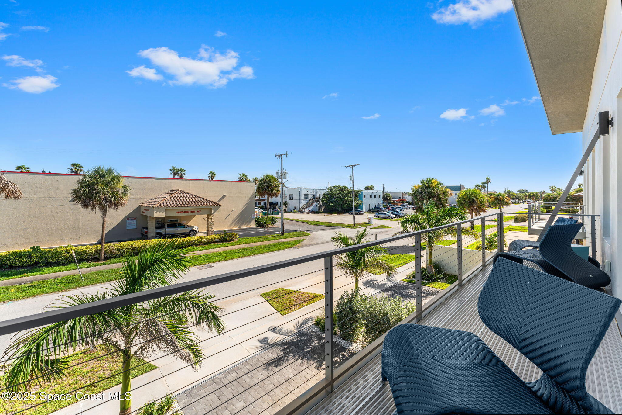 106 4th Avenue Indialantic, FL 32903 - Photo 26 of 37 a view of a balcony with chairs