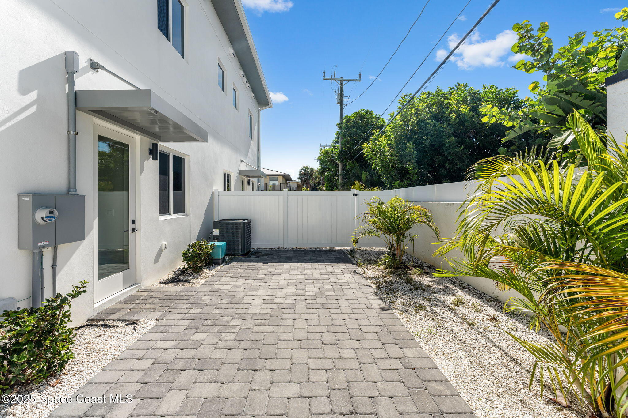 106 4th Avenue Indialantic, FL 32903 - Photo 27 of 37 a house with a outdoor space
