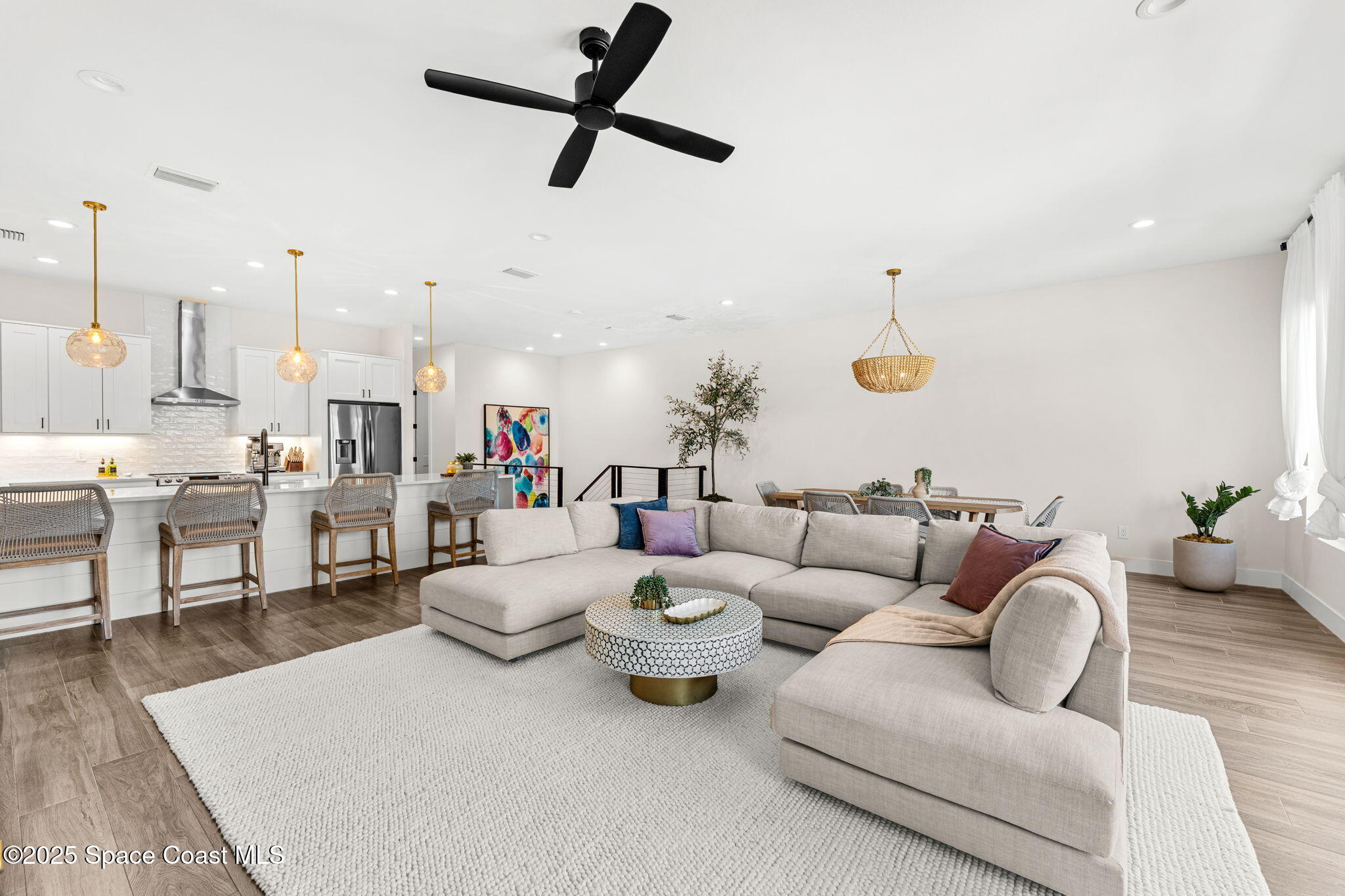 106 4th Avenue Indialantic, FL 32903 - Photo 3 of 37 a living room with furniture and a wooden floor