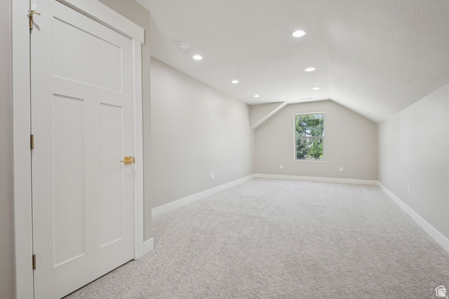 1471 Colbey Loop Santa Clara, UT 84765 - Photo 28 of 45 Spacious bonus room featuring pristine carpeting, recessed ceiling lighting, and abundant natural light from a fixed window