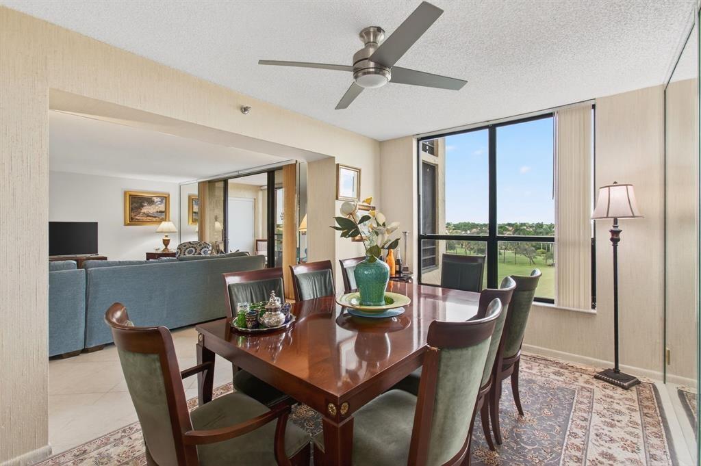 7145 Promenade Drive, Unit 602 Boca Raton, FL 33433 - Photo 19 of 90 a view of a dining room with furniture window and outside view