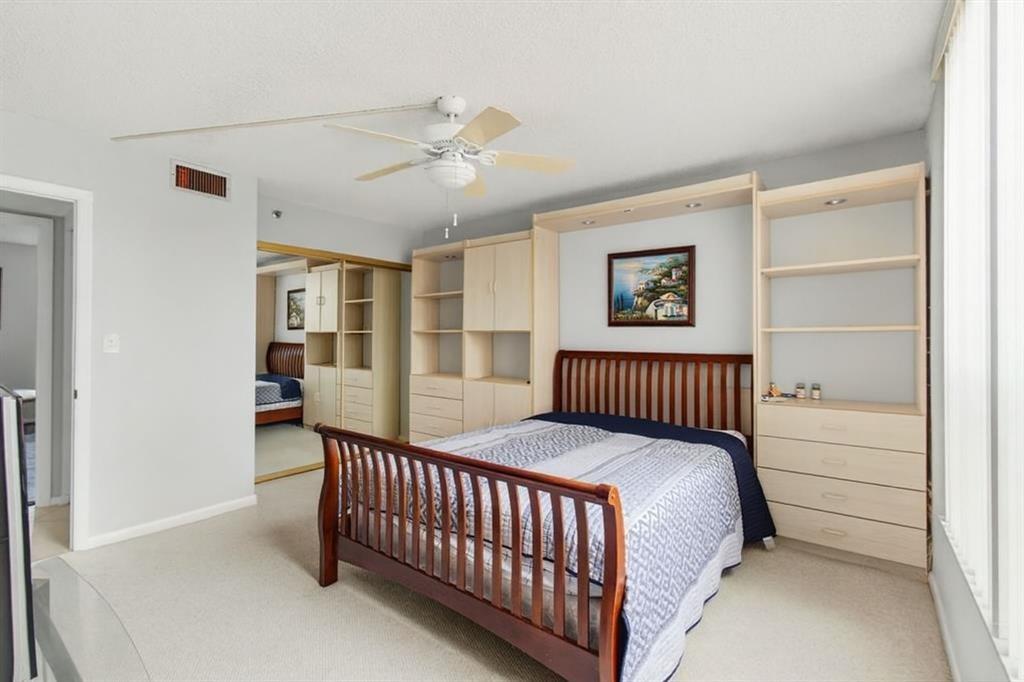 7145 Promenade Drive, Unit 602 Boca Raton, FL 33433 - Photo 50 of 90 a bedroom with a bed and a window