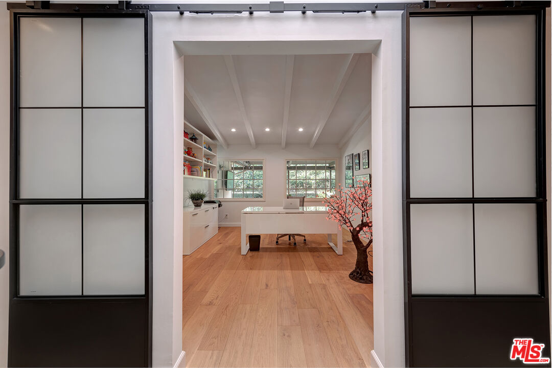 16012 Meadowcrest Road Sherman Oaks, CA 91403 - Photo 20 of 52 a view of a living room with a large window