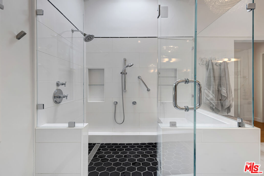 16012 Meadowcrest Road Sherman Oaks, CA 91403 - Photo 26 of 52 a bathroom with a shower